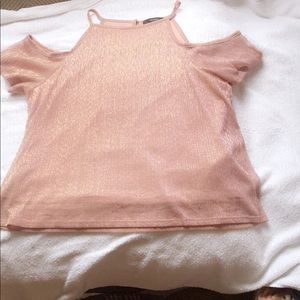 Rose gold shirt lose fitting easily styled.